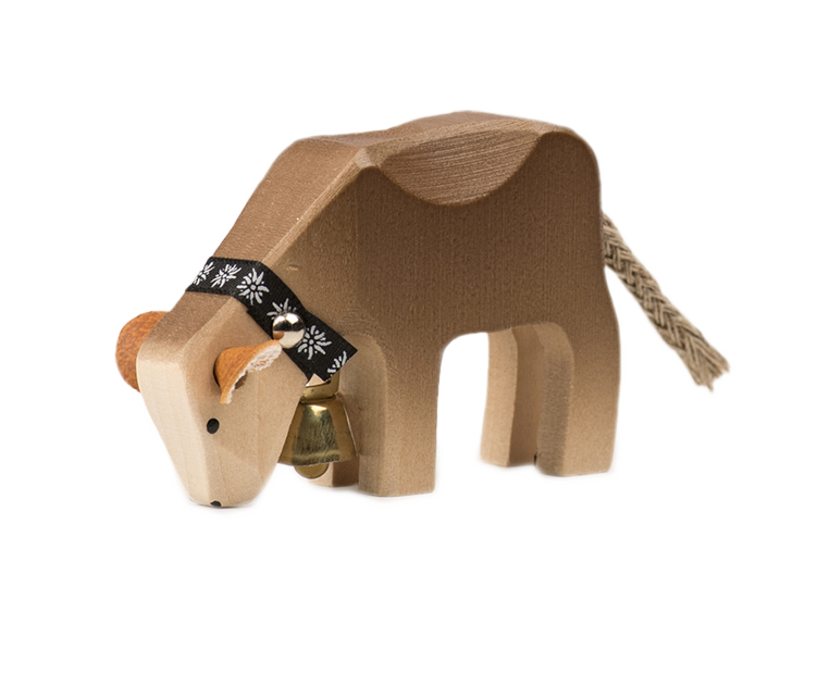 Calf eating Brown Swiss wooden animal