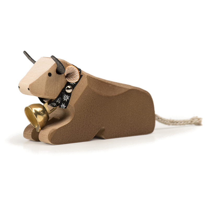 Cow lying down brown Swiss wooden animal