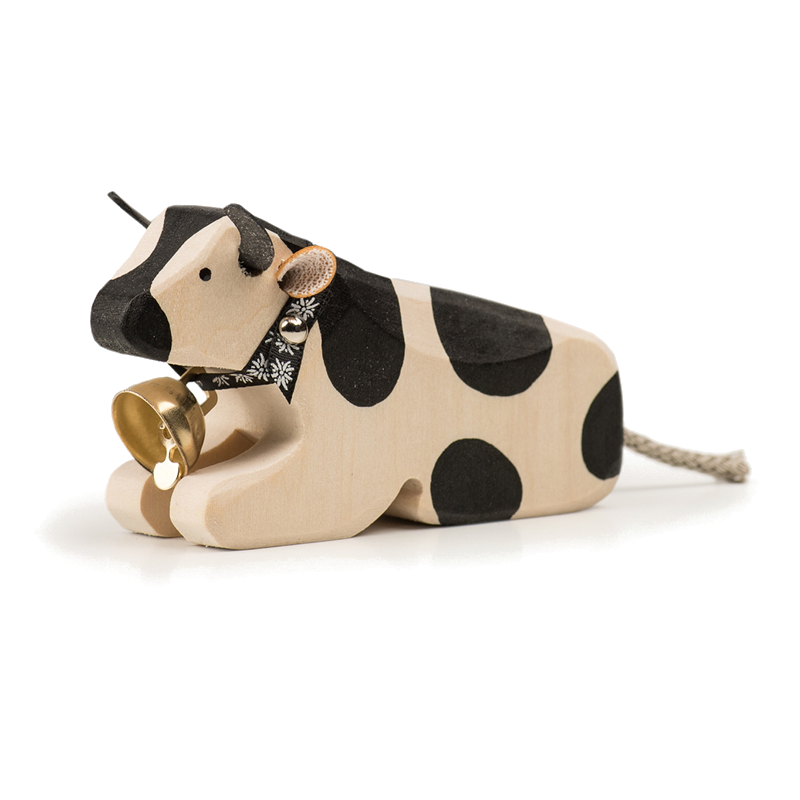 Mucca sdraiata animale di legno di Friburgo
