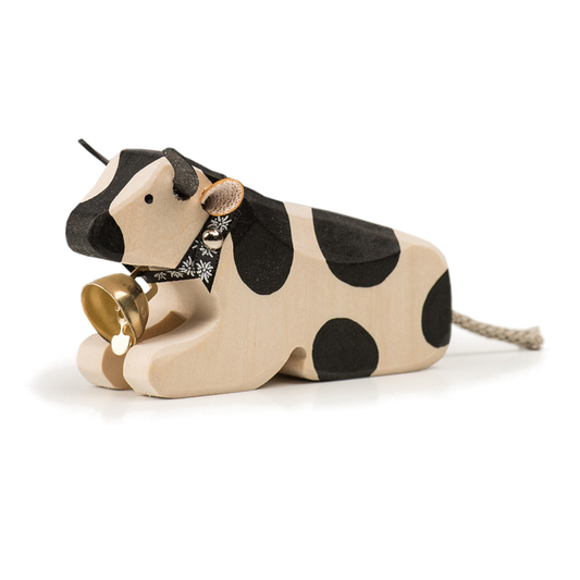 Mucca sdraiata animale di legno di Friburgo